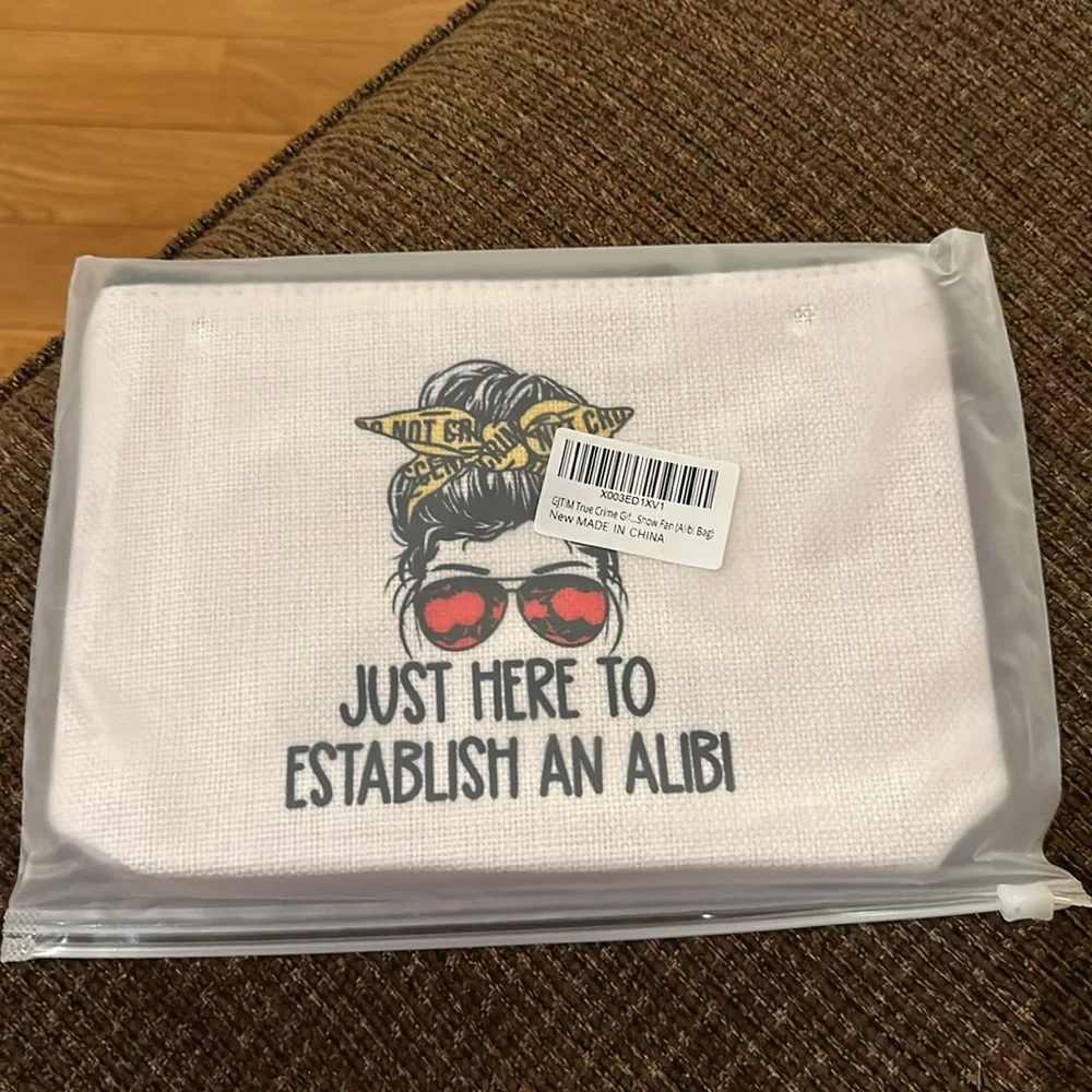 GJTIM women’s Just Here To Establish Alibi Graphic Makeup Bag